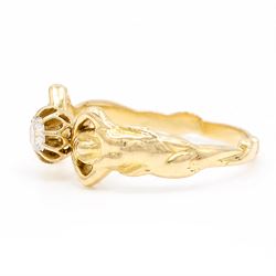 Gold diamond figural ring, single old cut diamond of approx 0.45 carat, with a nude female figure either side, stamped 18ct