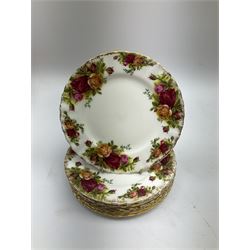 Royal Albert Old Country Roses part dinner and tea service comprising teapot, four tea cups and saucers, eight dessert plates, cake plate, cake stand, a tureen with cover, six dinner plates, an oval dish, two trinket dishes, bell and shoe decoration. 