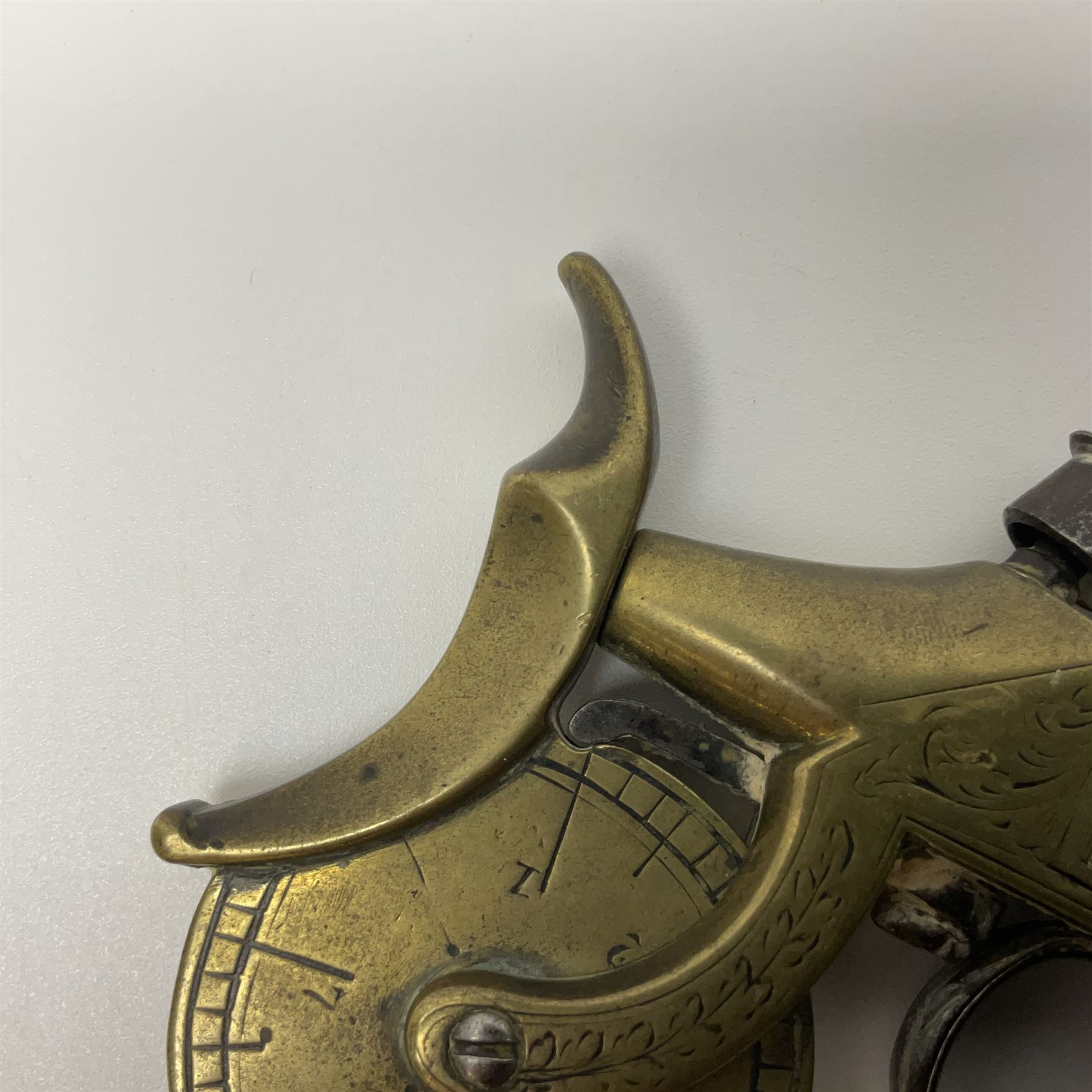 19th Century percussion eprouvette or gunpowder tester, with foliate engraved brass box lock and calibrated ratcheted wheel, steel trigger guard and walnut bag butt, L14cm
