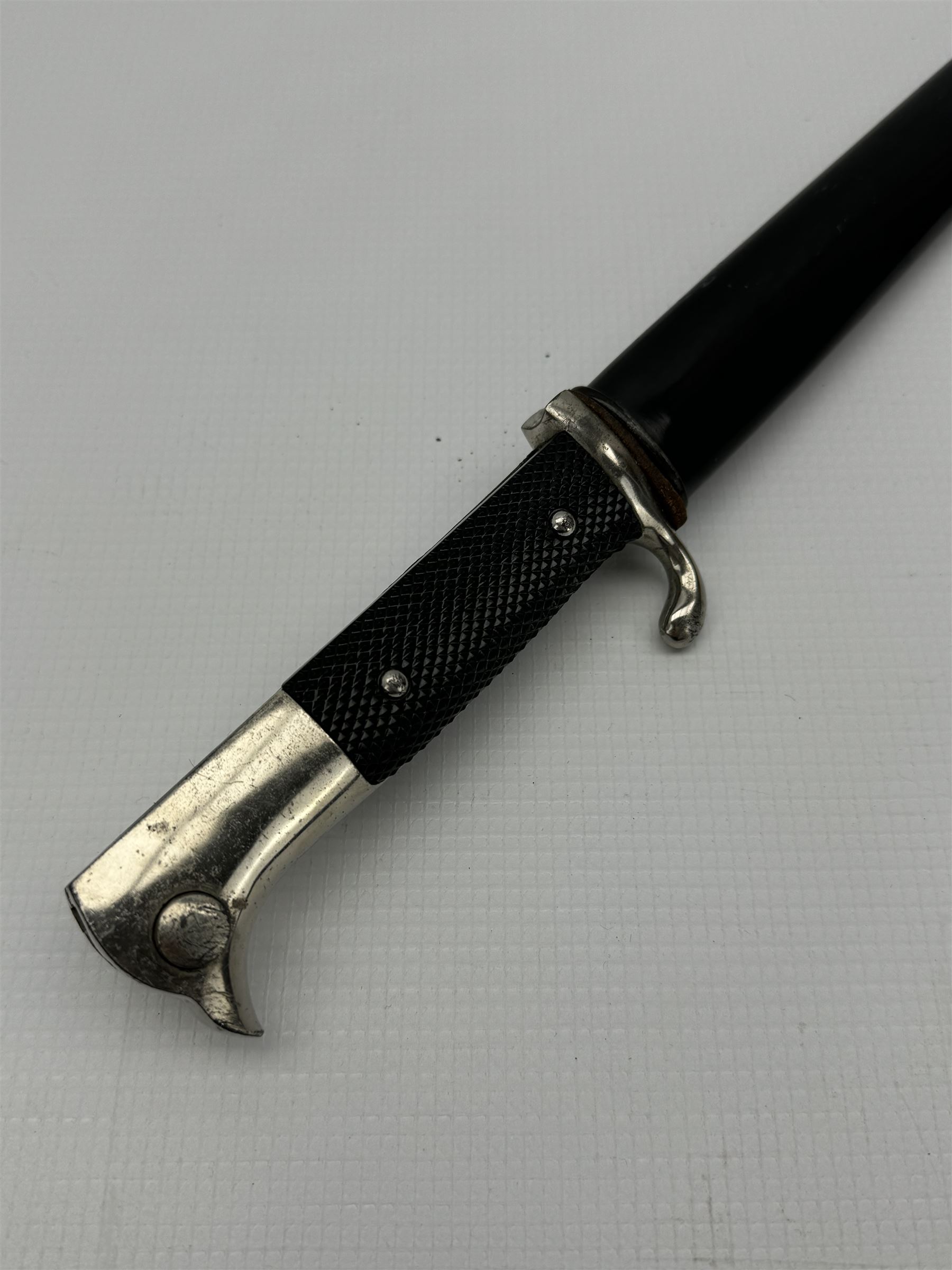 German Third Reich bayonet, the steel blade stamped E & F Horster, Solingen with black plastic chequered grip scales, L35cm