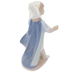 Four Lladro figures, comprising Loving Care no 6087, Young Nurse no 6307, Girl with Chicken no 4592 and Female Physician no 5197, three with original boxes 