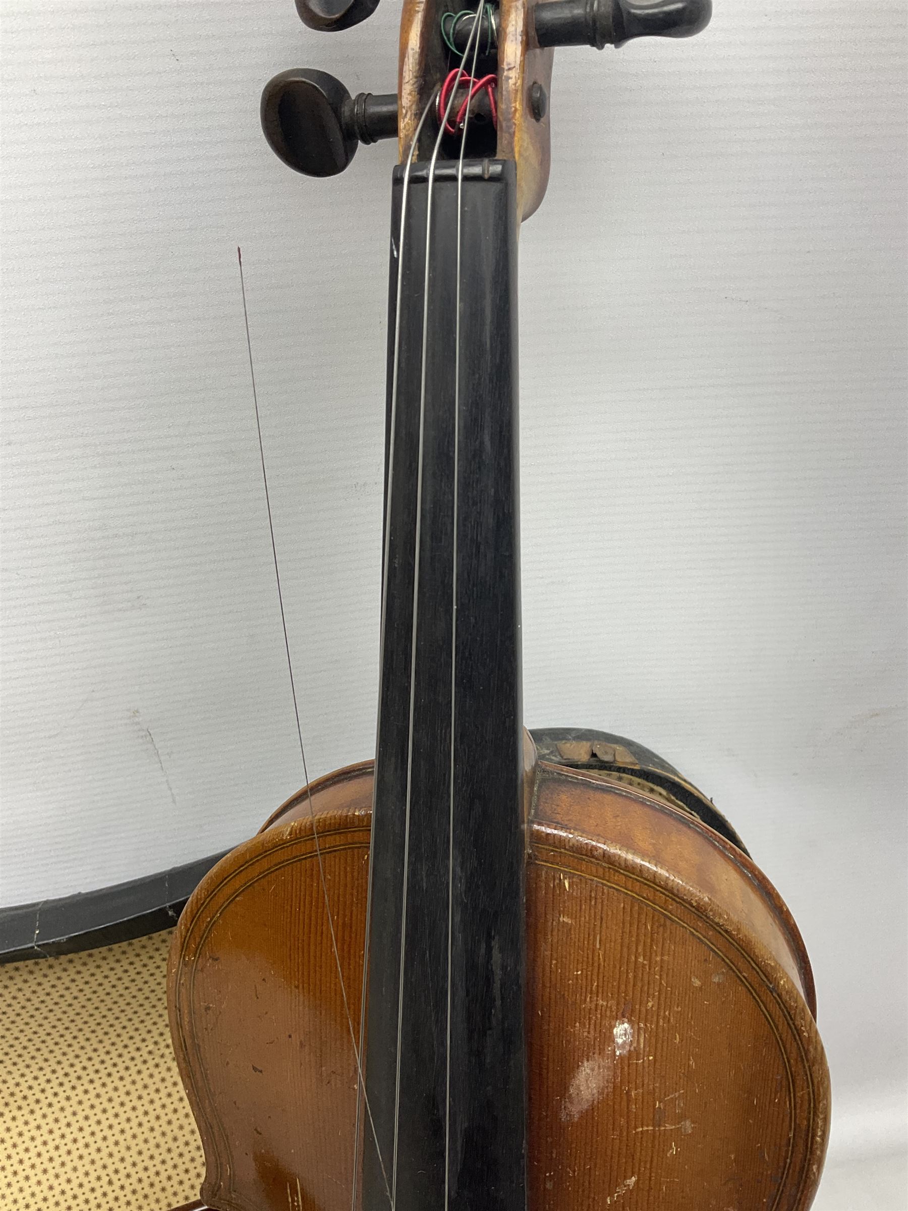 German copy of a Maggini violin c1900 with 35.5cm two-piece maple back and ribs and spruce top, bears label 'Maggini Deutsche Arbeit 1866' L59cm; in carrying case with bow