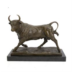 Bronze figure, modelled as a prancing bull, signed Milo, upon a marble rectangle base, base W36cm 