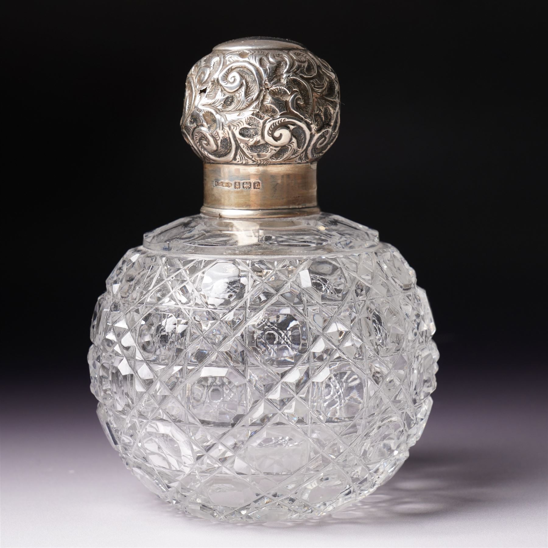 Edwardian glass globe scent flask with silver cover H13cm Birmingham 1905 and another of etched panel sided form with silver cover by Hilliard &Thomason (2)