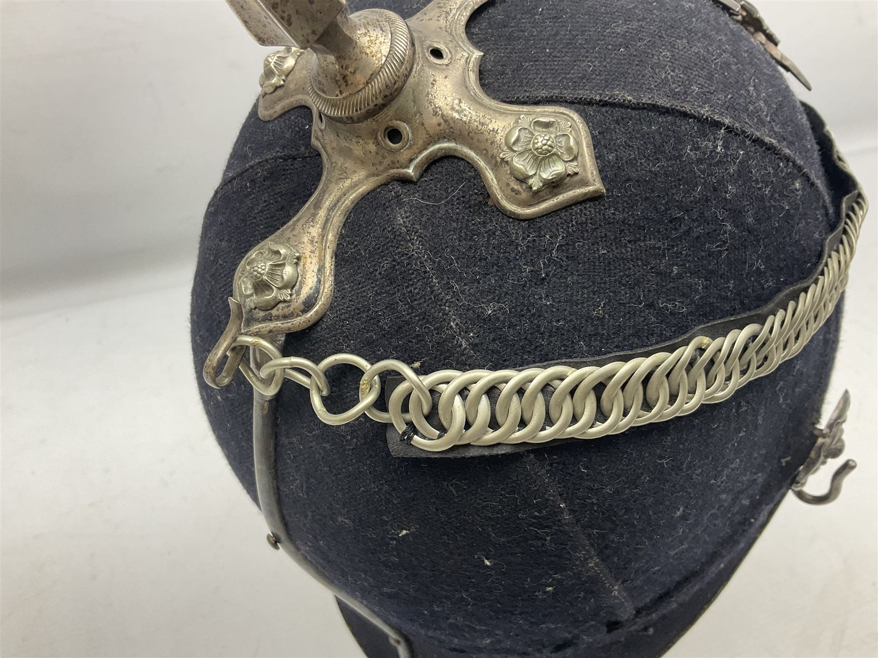 Victorian British Army South Lancashire Regiment 1st Volunteer Battalion other ranks blue cloth home service helmet with helmet plate, spike and chinstrap