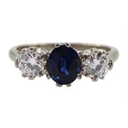 White gold three stone oval sapphire and round brilliant cut diamond ring, stamped 18ct, sapphire approx 0.60 carat, total diamond weight approx 0.60 carat 