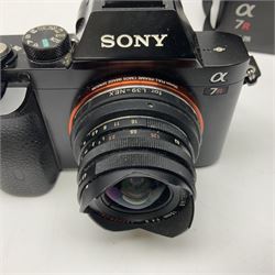 Sony Alpha 7R ILCE-7R camera body, serial no. 3985804, with 'Voigtlander Super Wide-Heliar f/4.5 15mm' lens, serial no. 9250212, camera with charger and in original box