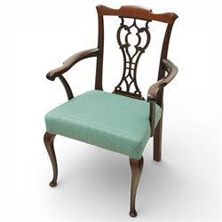 Georgian design mahogany elbow chair, the shaped top rail over a pierced vase shaped splat...