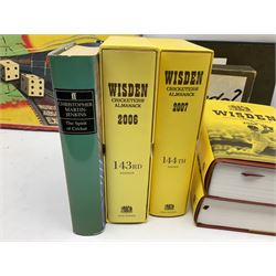 Books on cricket including early 21st century Wisdens; Rail Race board game; and early Waddington's Cluedo game