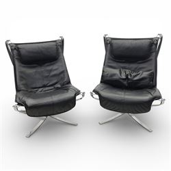 Pair of modernist black leather and chrome armchairs, in the manner of  Vatne Møbler, blac...