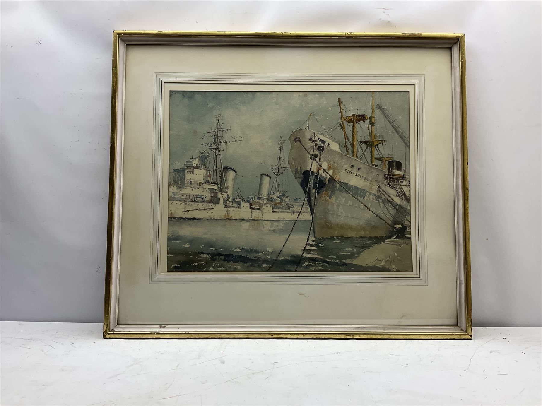 Allanson Hick (British 1898-1975): 'The Scylla' (Dido Class) cruiser in Hull Docks in the company of the Ellerman Lines 'City of Swansea', watercolour signed, titled verso 46cm x 60cm
Provenance: from the collection of the artist Terence Storey (1923-2018)