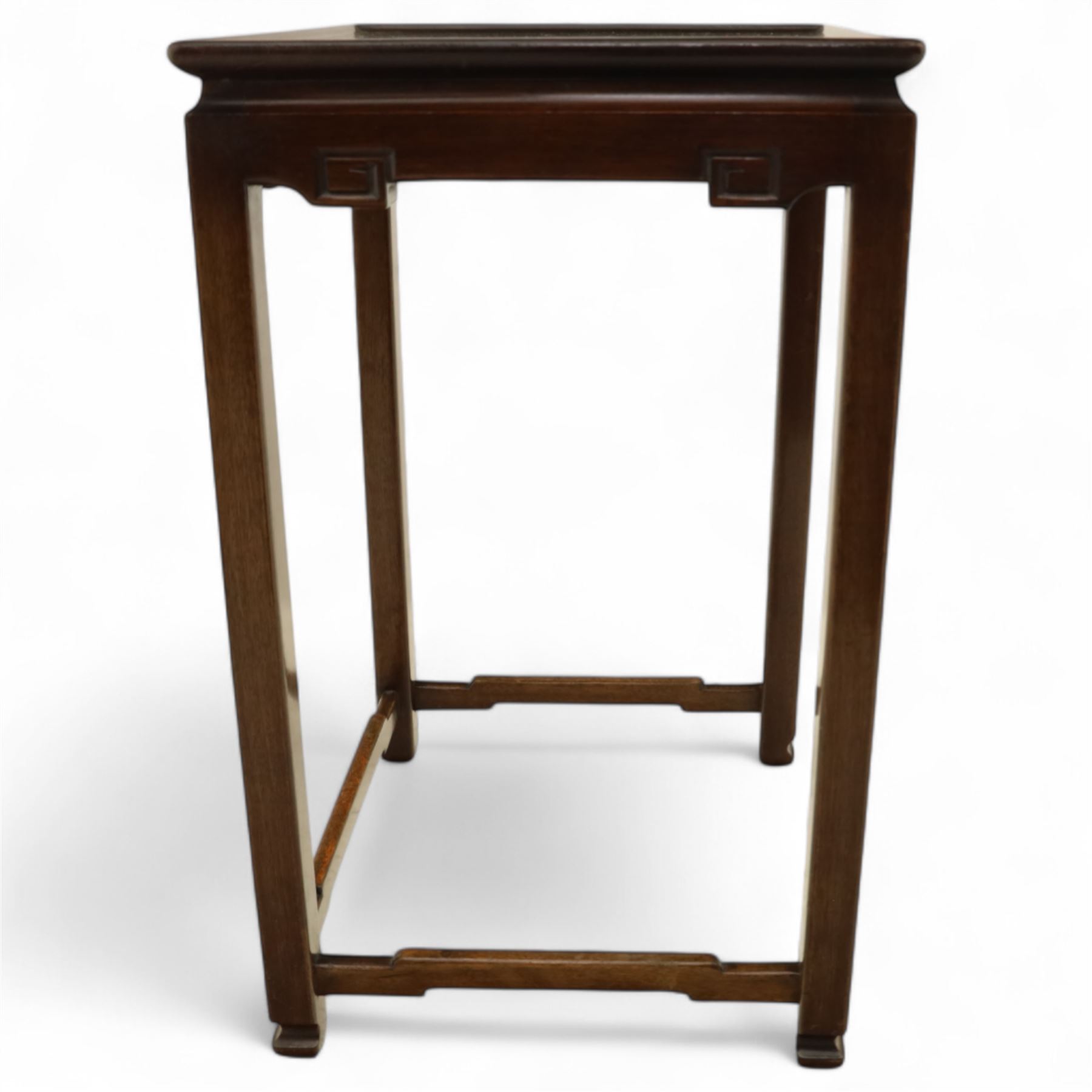 Whytock & Reid, Edinburgh  - Edwardian nest of three Chinese-style solid mahogany occasional tables, rectangular top with finely moulded edge above slim square section legs with subtly chamfered inner edges, joined by H-shaped stretchers, largest W40xD33xH52cm