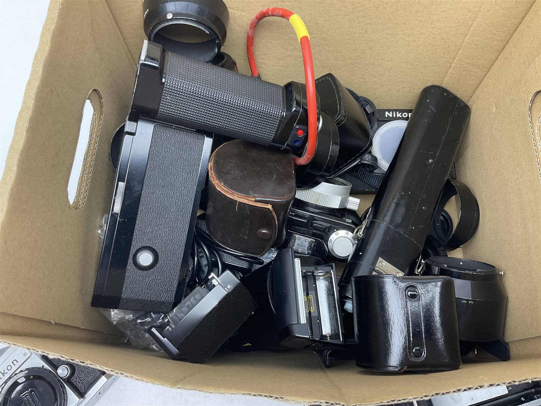 Nikon F-401 camera body, serial no. 2064766, together with Nikon Shutter Speed range, serial no.106395, and other Nikon equipment and camera bodies 