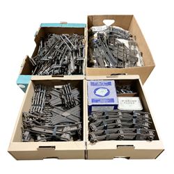 '0' gauge - large quantity of two-rail track with fixing clips including curves, straights, points, cross-overs etc; and boxed Meccano A3 Power Control Units; in four boxes