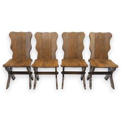 20th century set of four Dutch oak brutalist chairs, shaped back above a dished seat on an...