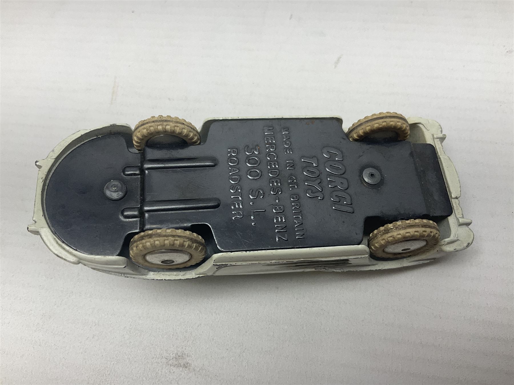 Eleven unboxed and playworn early die-cast models including Dinky Packard, Buick, two Jaguar Mark X and estate wagon, Corgi Mercedes-Benz 300S.L. Roadster, Ford Thunderbird, Citroen DS19 and Bentley Continental Sports Saloon, Spot-On Armstrong Siddeley Sapphire etc; all unboxed (11)