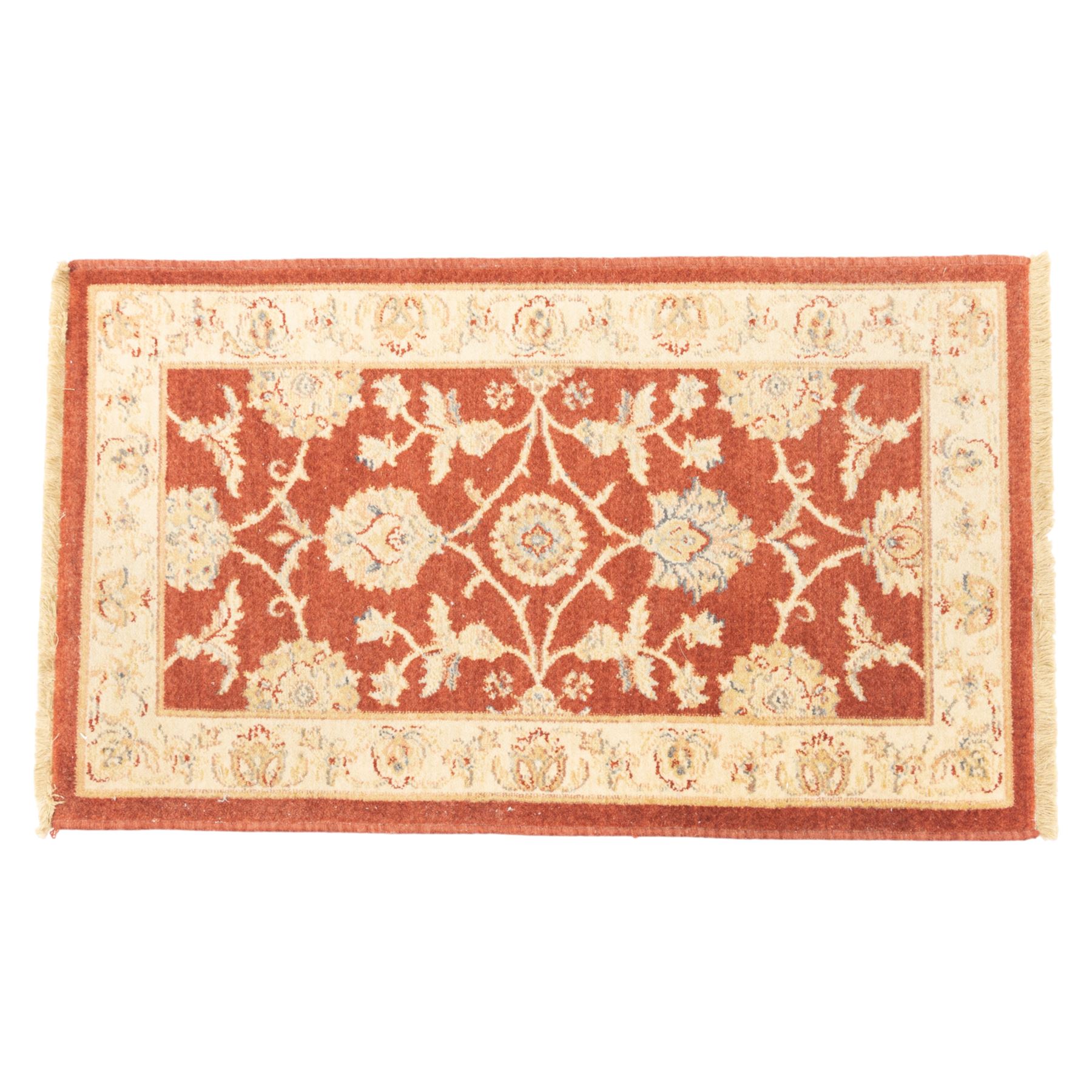 Lot of three Indo-Ziegler style wool rugs, comprising one with central floral medallion and palmette border, and two matching examples with scrolling vine and flowerhead motifs on a deep red field, each with decorative border in soft gold tones (60cm x 85cm) (65cm x 115cm)