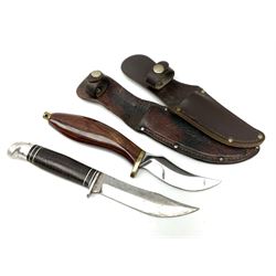 Western Boulder Colorado hunting knife the 11.5cm curving blade with maker's name to the ricassso, leather strip bound grip and aluminium pommel, in oak leaf decorated leather sheath L24cm; and J. Adams Sheffield hunting knife with curving blade and laminated wooden grip, in leather sheath (2)