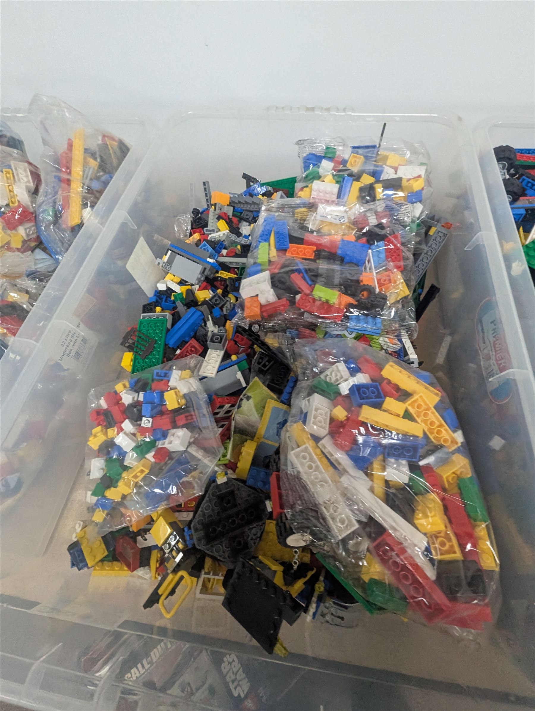 Large collection of loose Lego in four  boxes