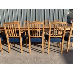 Light oak bespoke boardroom table, concave form, four sectional top on square discreet legs (12' x 5'), with twelve armchairs including 'Chairmans' chair