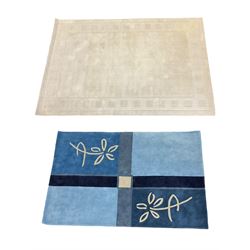Two large modern rugs