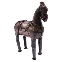 Indian silver horse, circa 1900, stood, with saddle and detailed bridle, H13cm, approximate gross weight 4.69 ozt (145.9 grams)