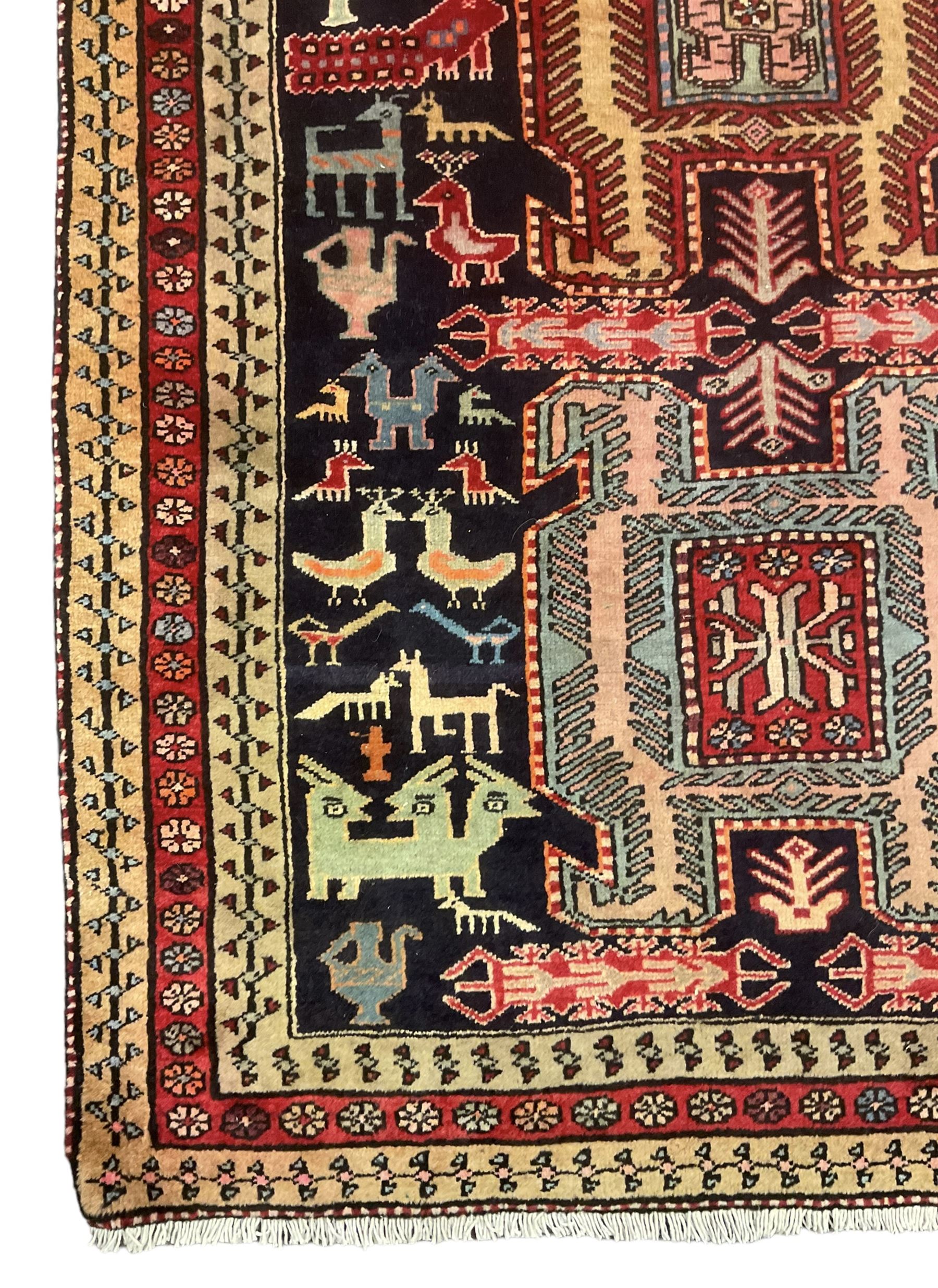 North West Persian Bidjar Kelleh, indigo ground field with five shaped medallions, decorated all over with stylised bird and animal motifs 