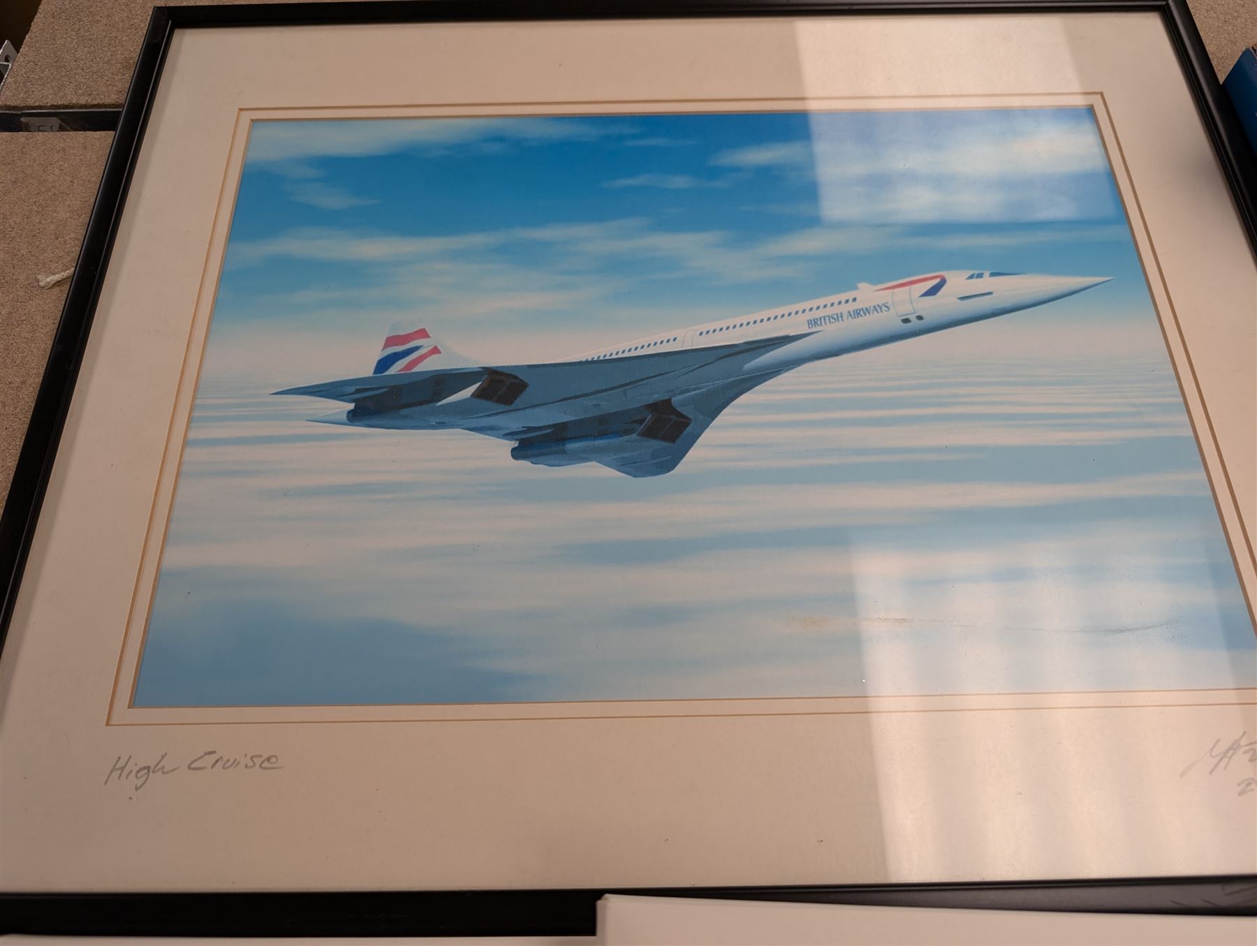 Collection of Concorde memorabilia, including paperweight, limited edition print, calendars, scale model, etc 
