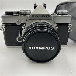 Olympus M-1 camera body, serial no. 110865, circa 1972, with ' Olympus M-System F.Zuiko Auto-S 1:1.8 f=50mm' lens, serial no. 105152, in leather case 
