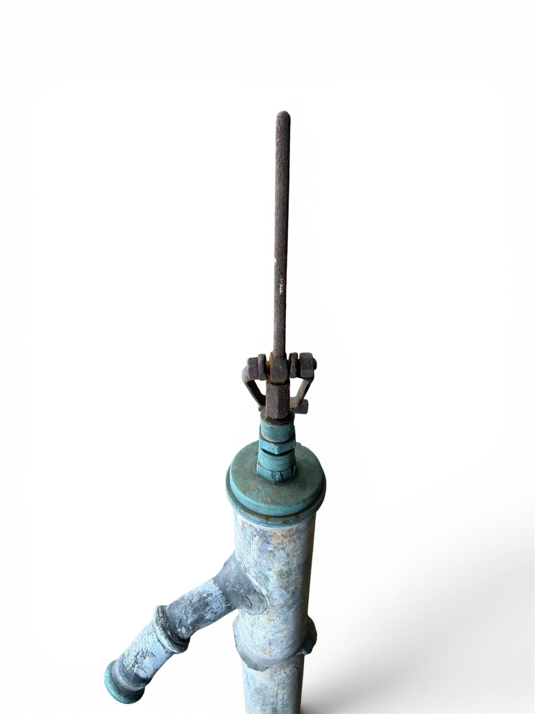 Georgian period lead garden water pump, with iron handle, set in square stone base