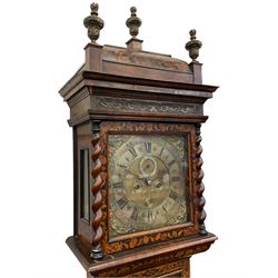William & Mary floral marquetry 8-day longcase clock c 1700, later mid-18th century four pillar rack striking movement with a square brass dial and subsidiary seconds dial, ringed winding holes and calendar aperture to the matted dial centre, with London cherub head cast spandrels and (later) fretted steel hands, silvered Roman numeral chapter ring with stylised fleur di Lis half hour makers, narrow Arabic five-minutes, minute track and inner quarter hour track, signed Thomas Horlock, Hammersmith, 
case with box upstand to the domed floral marquetry decorated caddy with three brass flame finials, above a moulded cornice and fretwork frieze,  inlaid hood door with attached barley twist pillars to the front above an inlaid convex moulding, full length D moulded trunk door with a circular lenticle inlaid with floral and foliage panels inhabited with birds, on a conforming marquetry plinth with applied double skirting. Thomas Horlock is recorded as a Whitesmith & Clockmaker of Hammersmith, Middlesex.
A copy of Thomas Horlock's will dated the 15th June 1757 is held at The National  Archives Kew.
