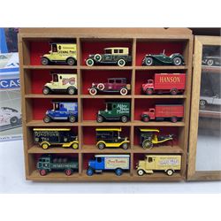Franklin Mint 'The Classic Cars of the Fifties' collection with display rack, eleven (ex.12) die-cast models and folder of paperwork; another wall mounting display cabinet containing fifteen die-cast models; and an unused boxed Master Tools model display case
