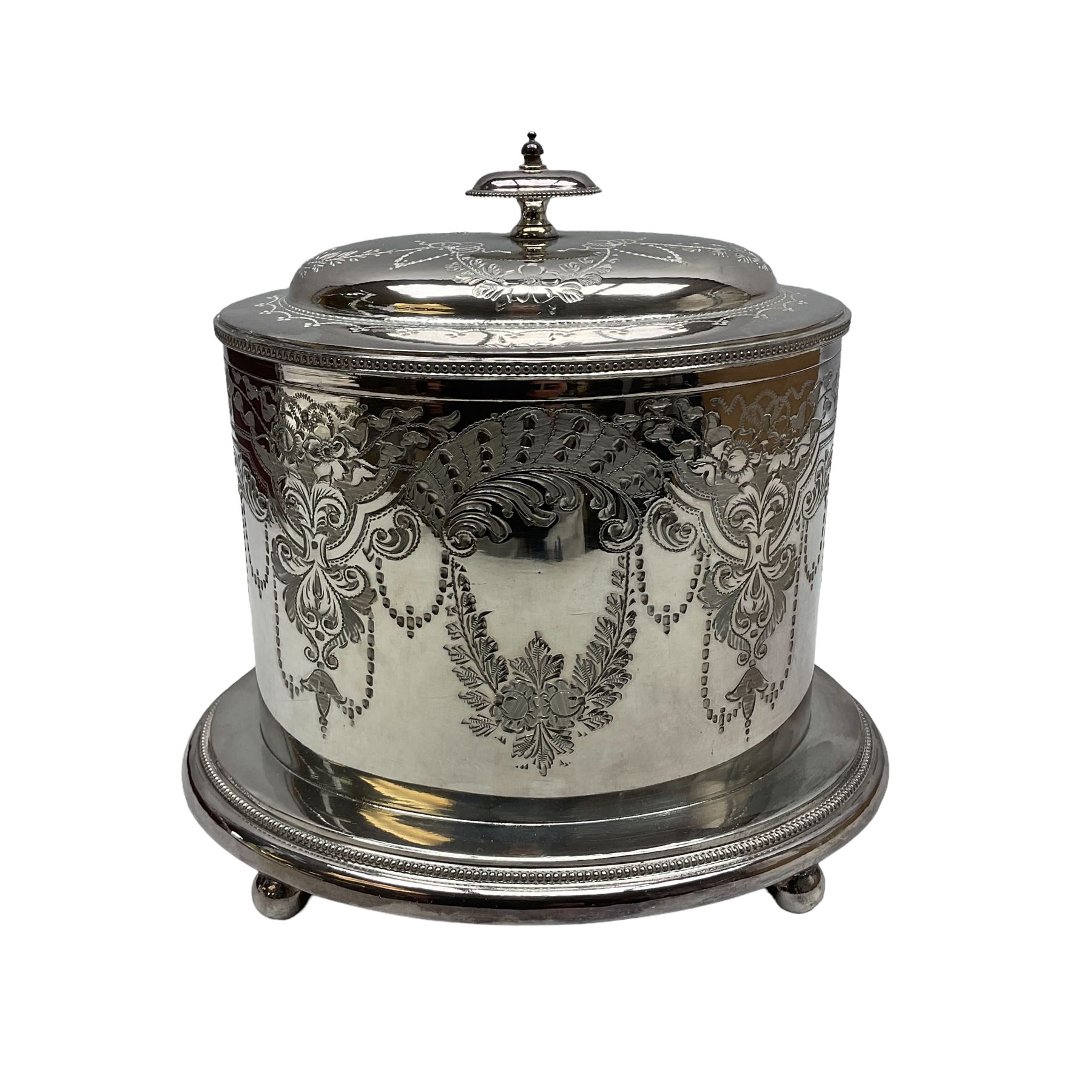 Late Victorian silver-plated biscuit barrel by William Hutton & Sons, on integral stand with four bun feet and ornate foliate engraved decoration, H20cm