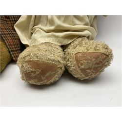 Two early 20th century straw filled jointed teddy bears, first example wearing a tweed jacket bearing Geoffrey Saville label, with leather padded paws and ears, horizontally stitched nose and humpback; second example with applied eyes, vertically stitched nose and faux leather paw pads, both with growler mechanisms, tallest H74cm 