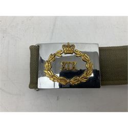 British Army Officers Sam Browne leather belt with shoulder strap; and webbing belt with Potter London Staybrite buckle for 19th Regiment of Foot (Green Howards) with various markings (2)