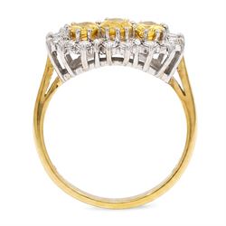 18ct gold yellow sapphire and diamond cluster ring, three oval cut sapphires, surrounded by twenty round brilliant cut diamonds, London 1988, total sapphire weight approx 1.15 carat, total diamond weight approx 0.50 carat