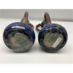 Pair of Art Nouveau style vases, probably Belgian, each with merging blue, brown and green decoration and three handles, impressed LSV beneath, H32cm