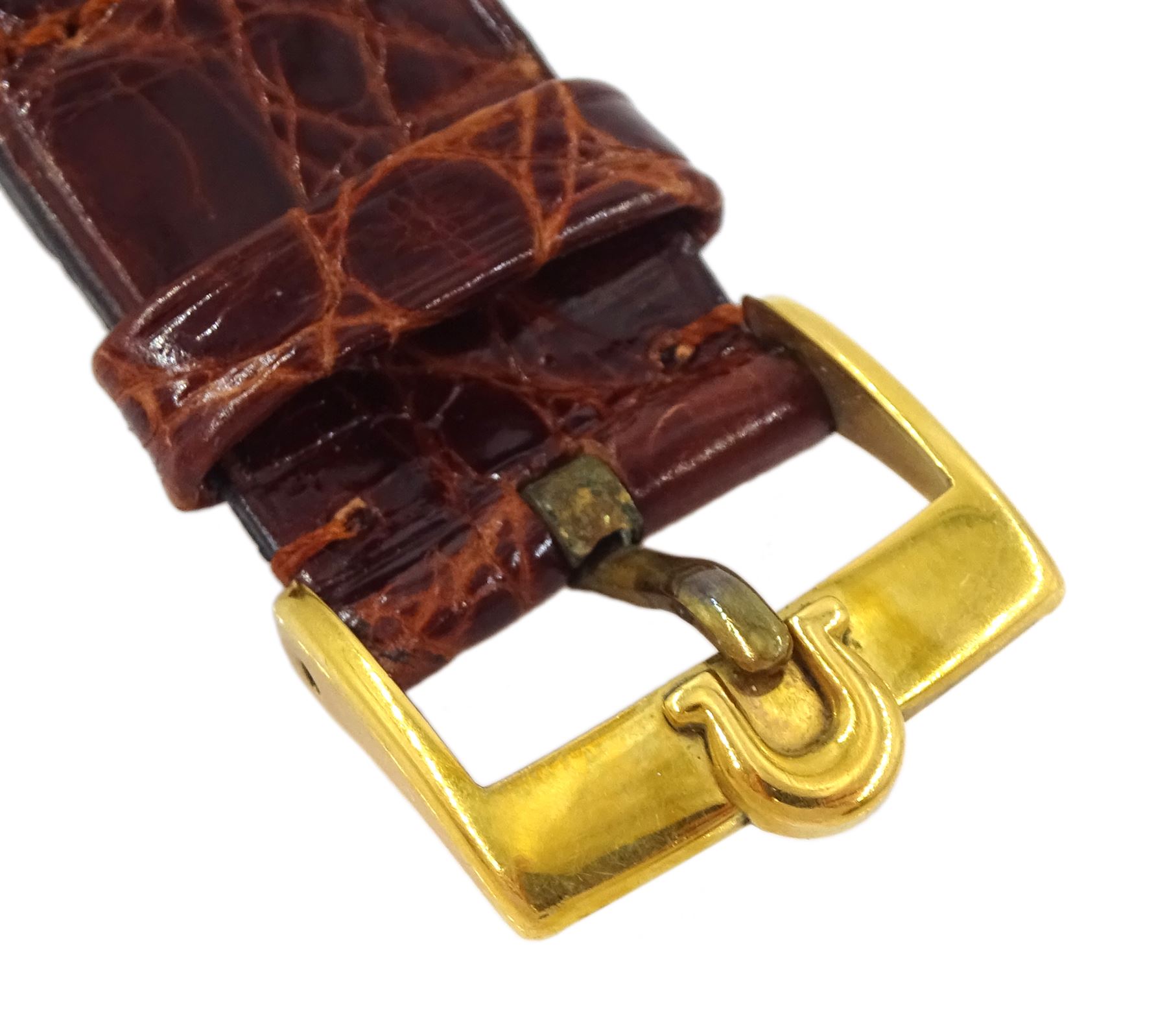 Omega Seamaster De Ville gentleman's 18ct gold automatic wristwatch, Ref. 166020 SC, Cal. 565, silvered dial with baton hour markers and date aperture, stamped 18K, with Helvetia hallmark, on an Omega brown leather strap with Omega gilt buckle