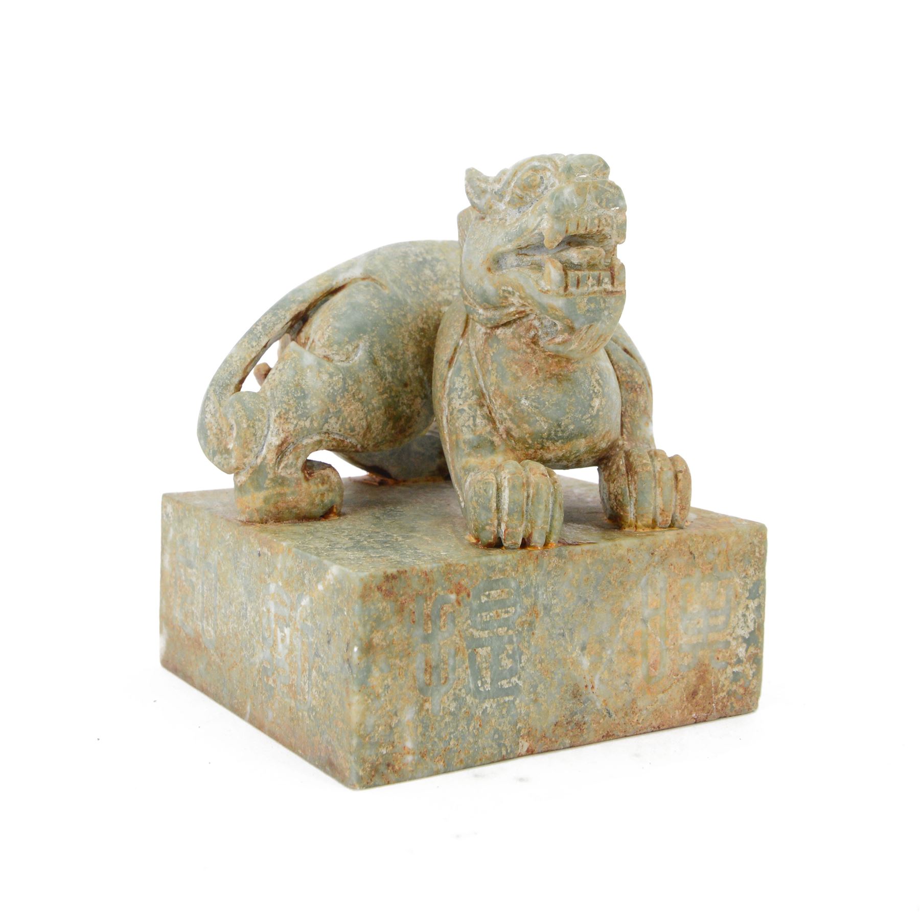 Large 20th century Chinese patinated hardstone dragon seal, the square seal with incised characters to sides and underside, surmounted by the figure of a dragon, H15cm W13cm D13cm