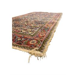 Persian-style wool rug, cream field with floral and geometric motifs, wide floral border (74cm x 142cm); Persian wool rug, beige field with dense floral patterns, narrow floral border (70cm x 144cm); Tribal wool rug, red and navy with diamond motifs (96cm x 60cm); Persian pictorial wool rug, black field with vase, birds, and floral border (70cm x 73cm)