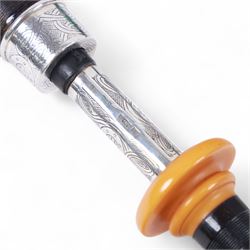 Set of late 20th century silver mounted bagpipes, the turned ebonised hardwood drone rods with Celtic knot and stipple engraved silver collars and ivorine mounts, hallmarked Bernie Leigh, Birmingham 1991, with R.G Hardie Glasgow plastic chanter and bag in green and blue Armstrong tartan, contained within a plush lined hard case, with a collection of spare reeds, drone rods, chanter, bags, cleaning accessories and other accessories 