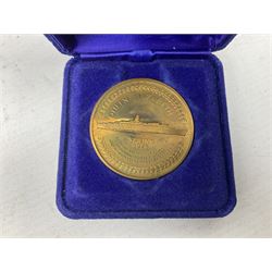 Queen Elizabeth II cradle of civilization cruise 1976 bronze medallion with related book and two other Queen Elizabeth II commemorative medallions for cruises in 1975 and 1976, all cased
