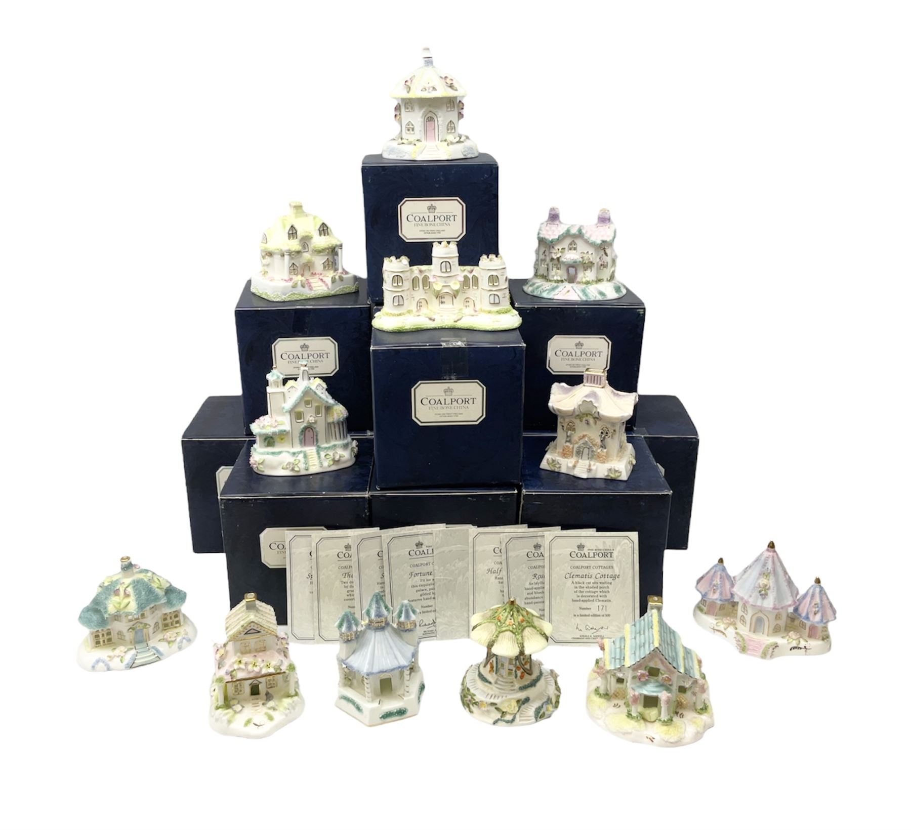 Twelve Coalport bone china pastille burner cottages, to include Fortune Towers, Summer Palace, The Vinery, Springtime Cottage, Dream Villa, Half Moon House, etc, all with original boxes and some with certificates 