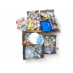 Large collection of loose Lego, including minifigures, together with three Lego ideas books, in five boxes