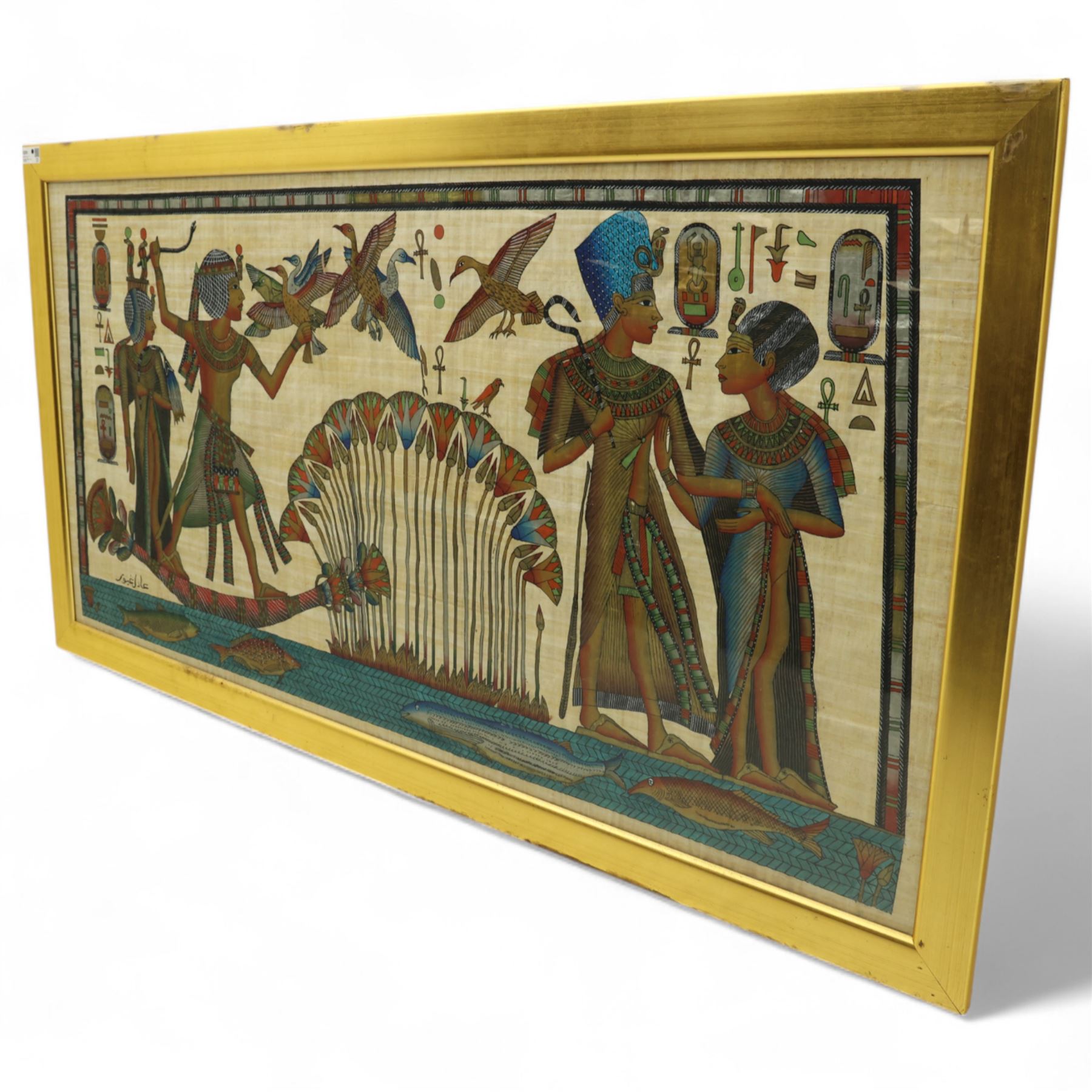Large papyrus framed scroll in a gold painted glazed frame 