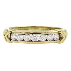 9ct gold channel set seven stone round brilliant cut diamond ring with chevron decoration, London import mark, total diamond weight 0.33 carat