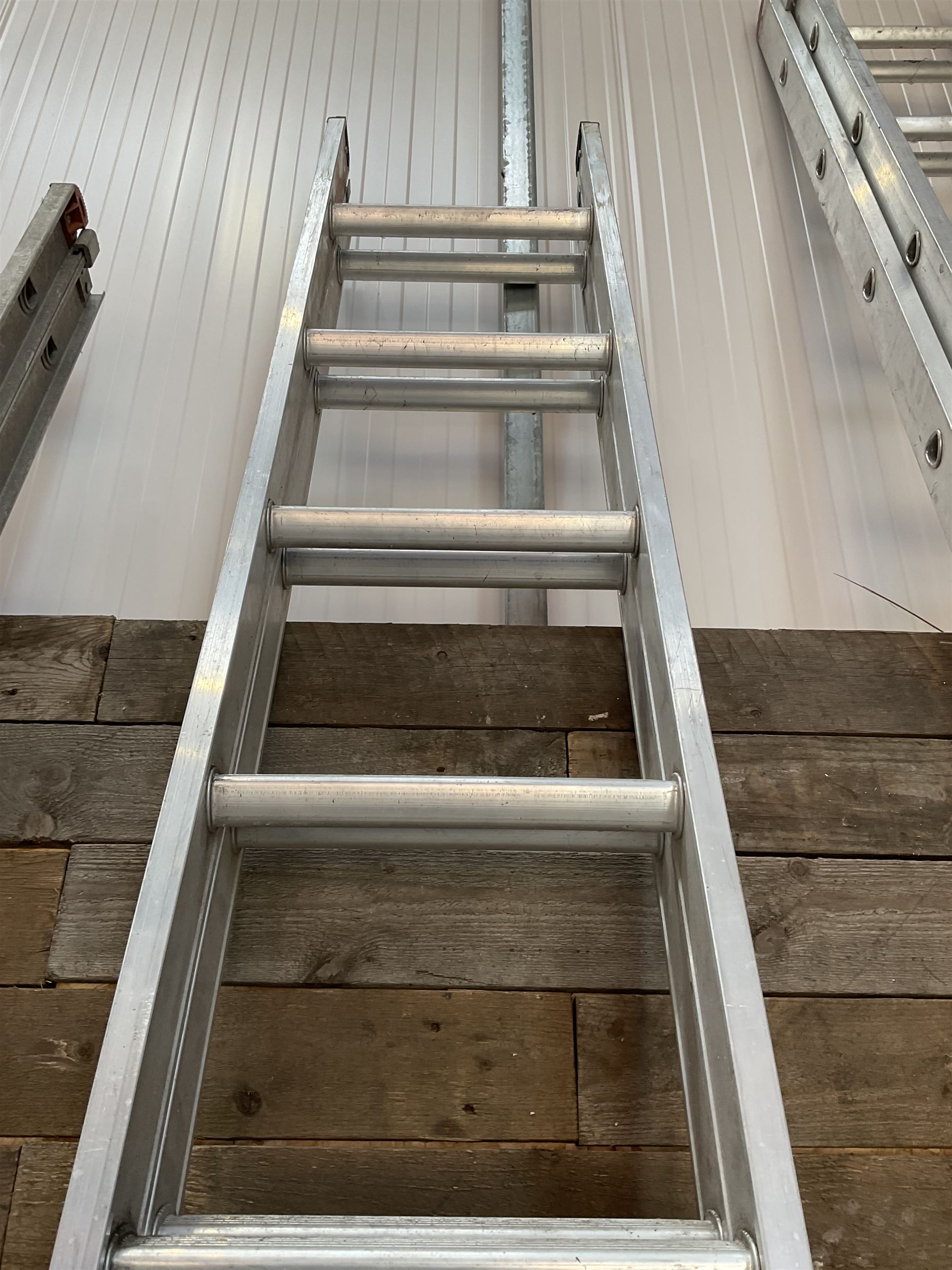 Abru pair of aluminium extendin ladders, 3.4m - 6.1m