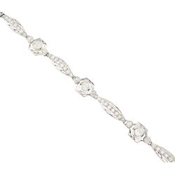 Art Deco French platinum diamond bracelet, six pierced design navette shaped links, set with rose cut diamonds, each spaced by three old cut diamonds, milgrain set in a pierced fancy hexagonal setting, dogs head hallmark, total diamond weight approx 2.00 carat