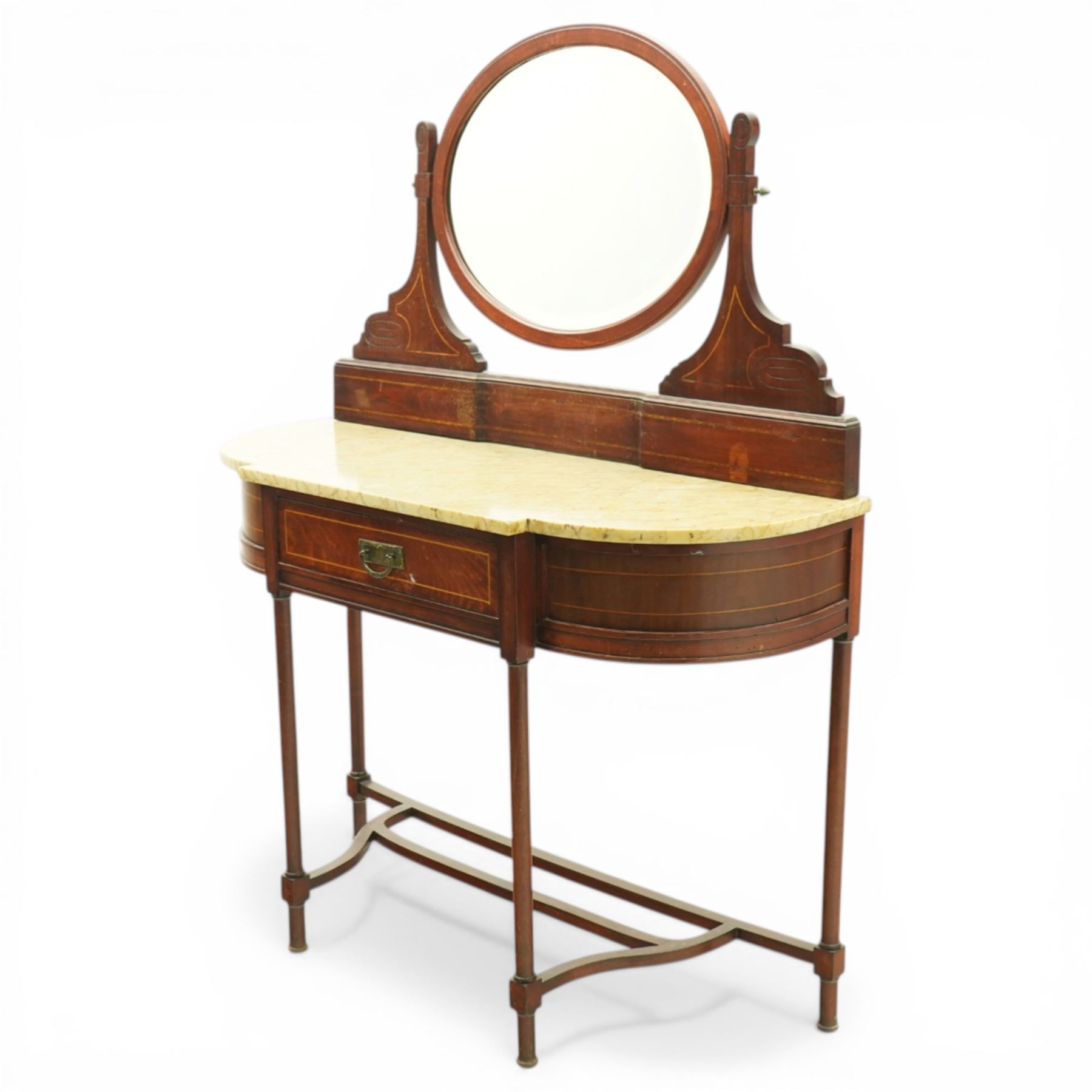 Edwardian inlaid mahogany dressing table, serpentine fronted marble top over central frieze drawer flanked by bowed sides, raised back with line inlaid decoration and oval swing mirror, on slender tapering supports united by shaped undertier