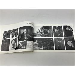 Black painted three colour railway lamp with revolving filters, H29cm; BR Acme Thunderer whistle; three railway peaked caps, two with BR Intercity 125 badge; small album of photographs of railway interest etc